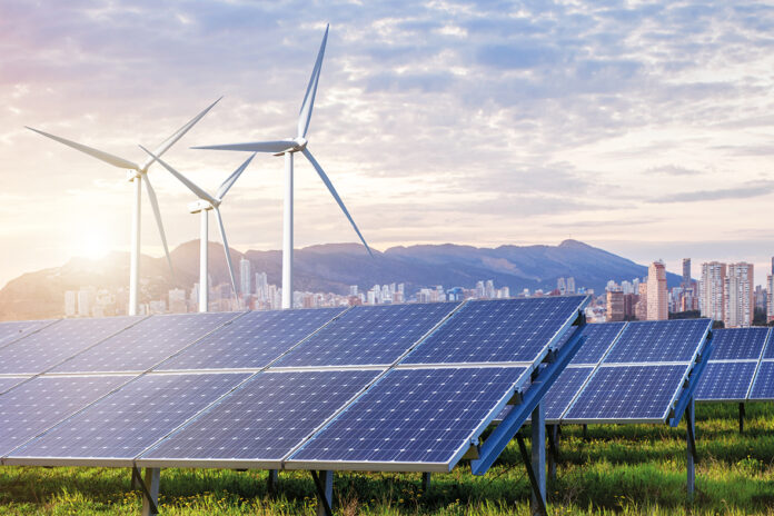 Solar panels and wind turbines with city